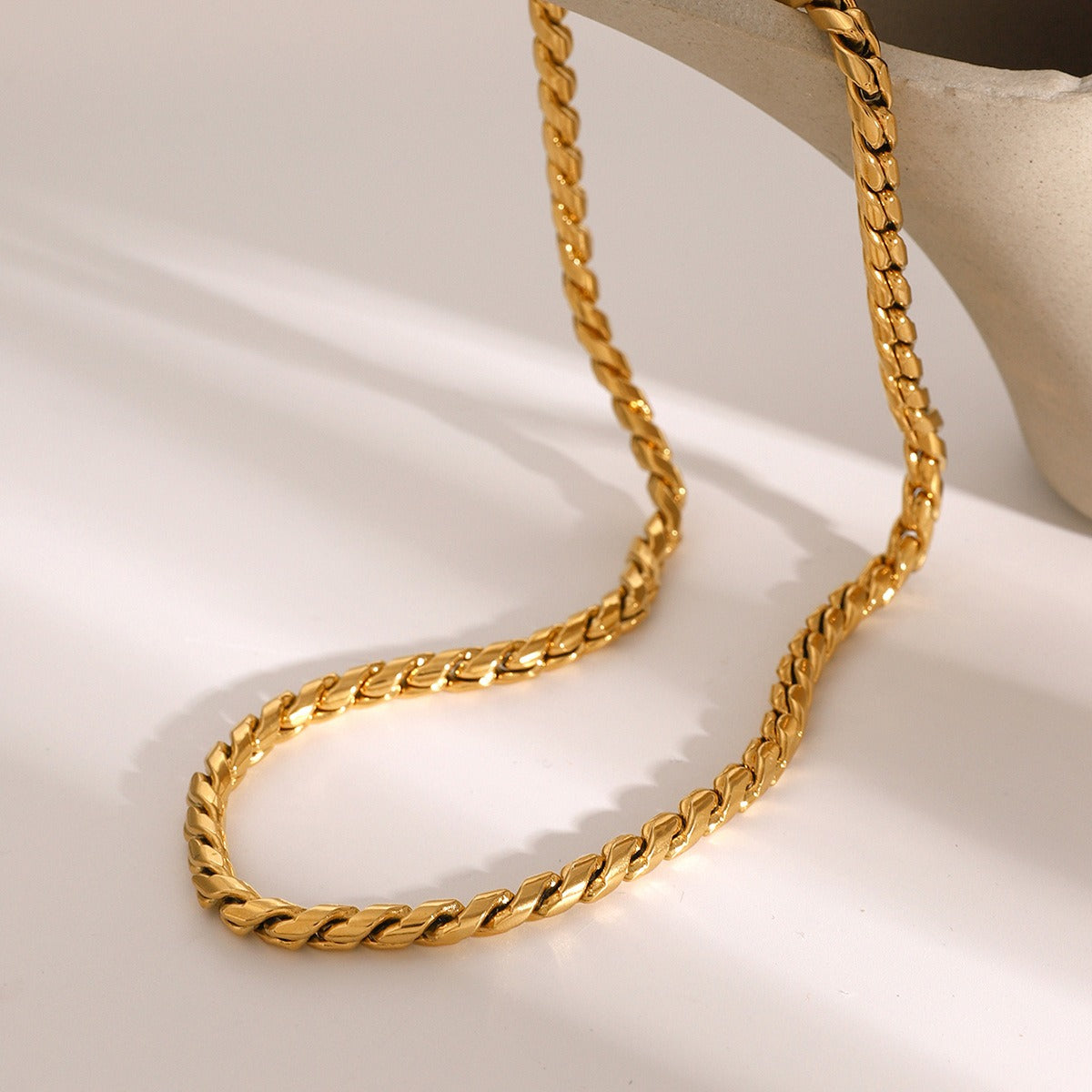 Stylish 18K gold chain bracelet and necklace set in a simple, minimalist design, offering an elegant and timeless look, perfect for everyday wear or special occasions.