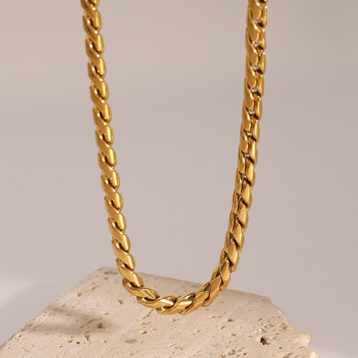 Stylish 18K gold chain bracelet and necklace set in a simple, minimalist design, offering an elegant and timeless look, perfect for everyday wear or special occasions.