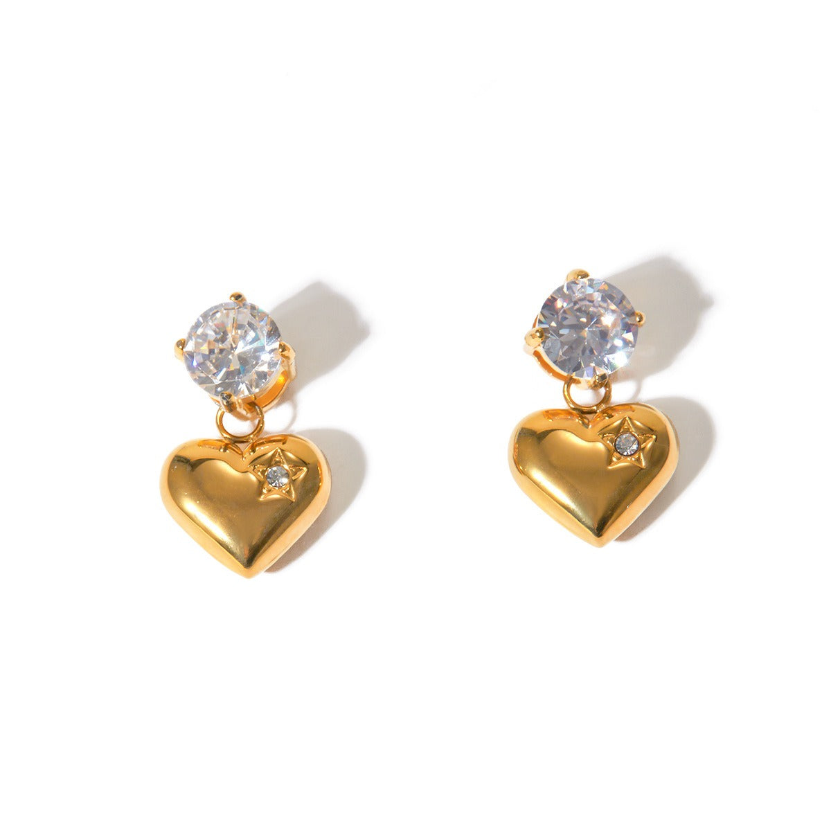 Elegant 18K gold heart-shaped earrings with sparkling inlaid zircon stones, combining luxury and charm for a sophisticated, timeless look