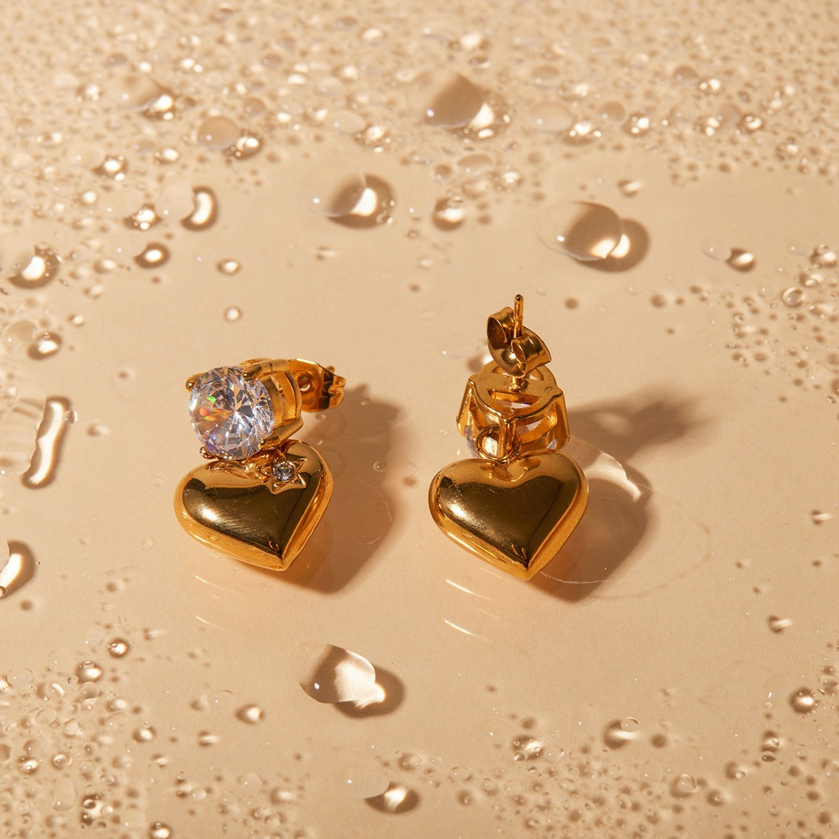 Elegant 18K gold heart-shaped earrings with sparkling inlaid zircon stones, combining luxury and charm for a sophisticated, timeless look