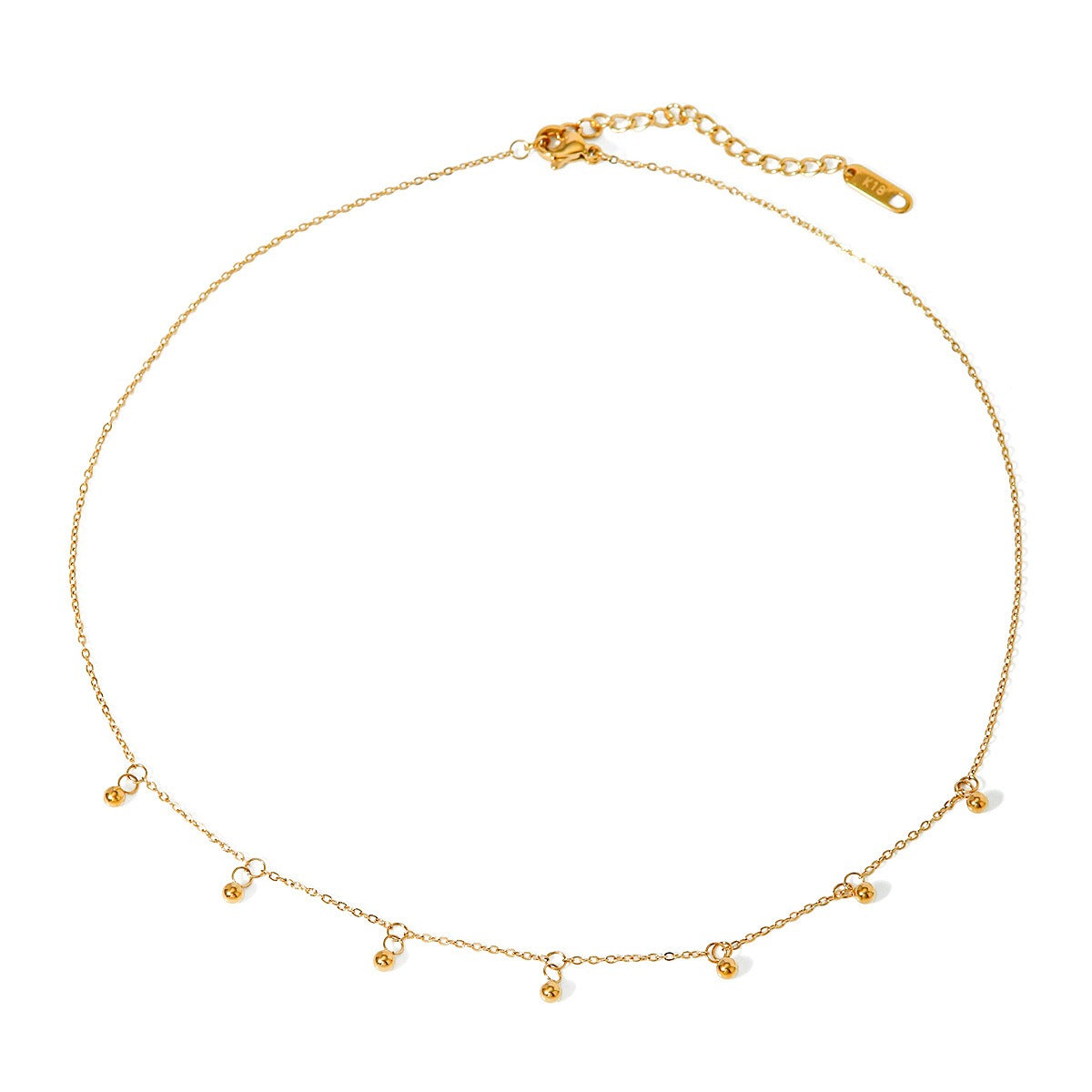 Delicate 18K gold necklace featuring light, round bead design, offering a minimalist and elegant look, perfect for adding a touch of sophistication to any outfit